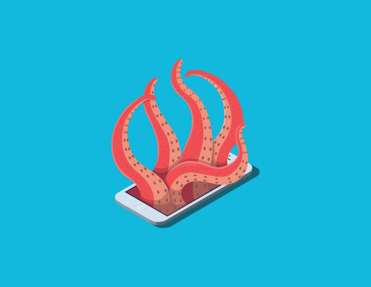 An octopus climbing out of a smartphone.